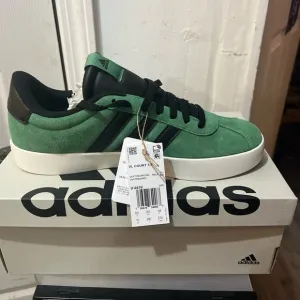 Adidas Green and Black Sneakers with Suede Texture