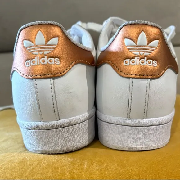adidas Superstar White and Gold Athletic Shoes