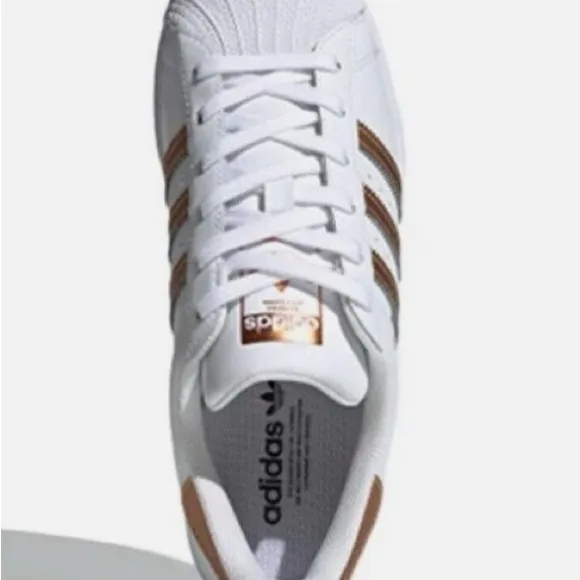 adidas Superstar White and Gold Athletic Shoes