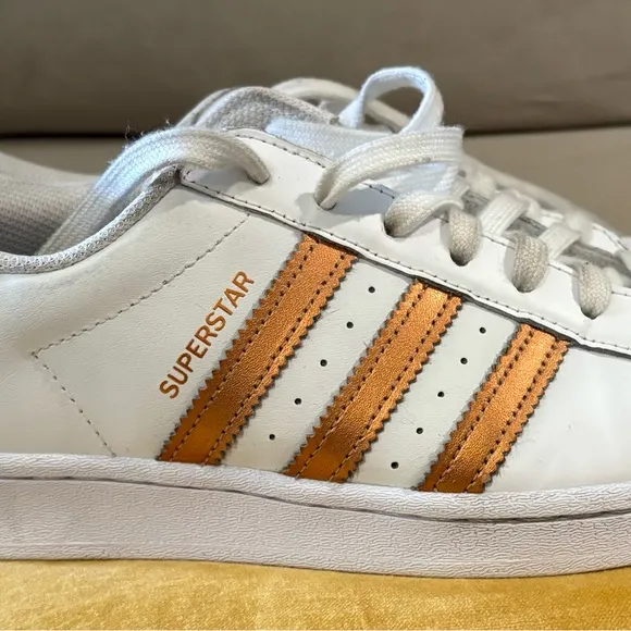 adidas Superstar White and Gold Athletic Shoes