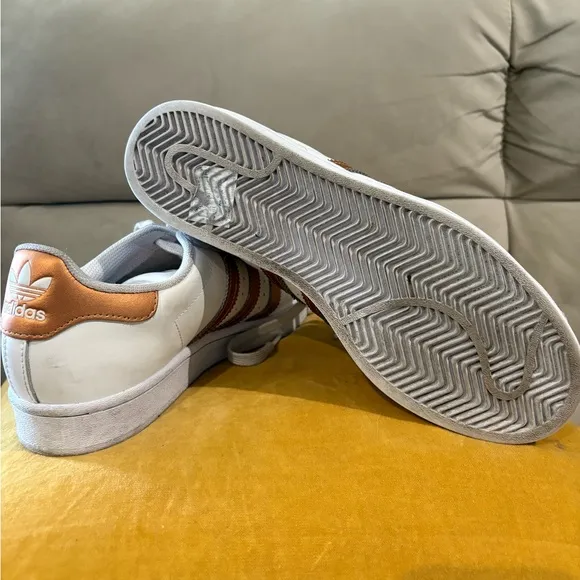 adidas Superstar White and Gold Athletic Shoes