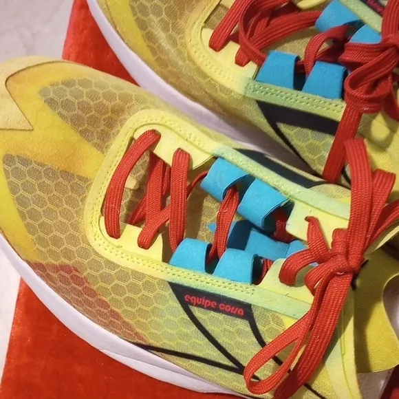 Adidas Yellow and Red Athletic Shoes with Modern Design