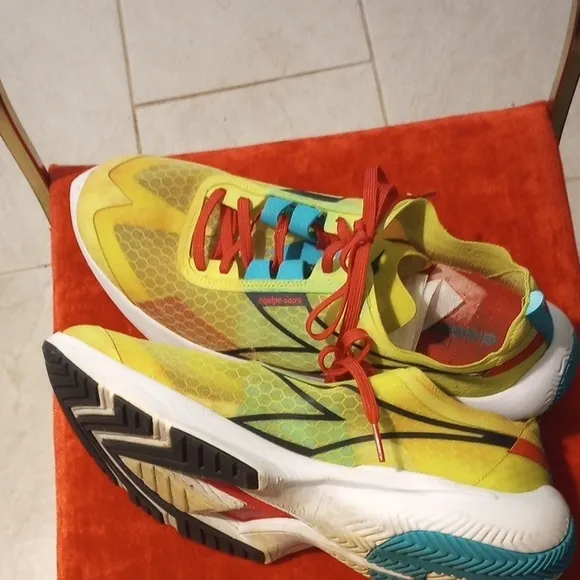 Adidas Yellow and Red Athletic Shoes with Modern Design