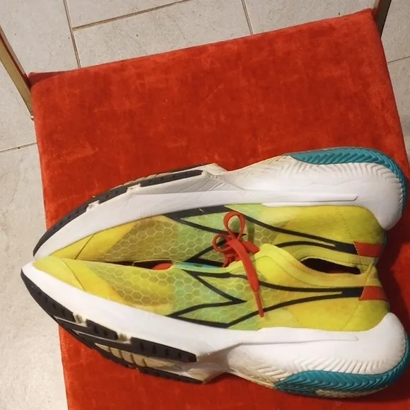 Adidas Yellow and Red Athletic Shoes with Modern Design