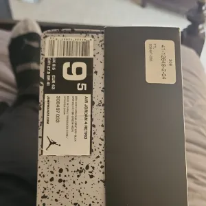 Air Jordan Retro Athletic Shoes - Black and White
