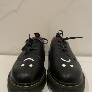 Black Leather Dr Marten Shoes with Smiley Design