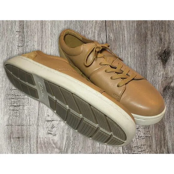 Clark’s men’s tan sneakers. White soles. Suede on heels. Size 8.5