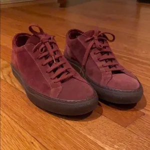 Common projects red suede minimalist sneakers