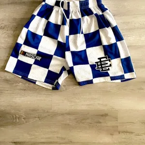 Eric Emmanuel blue and white checkered shorts