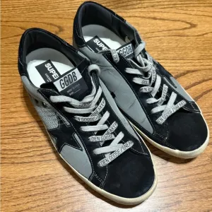 Golden Goose Black and Gray Sneakers with Retro Design