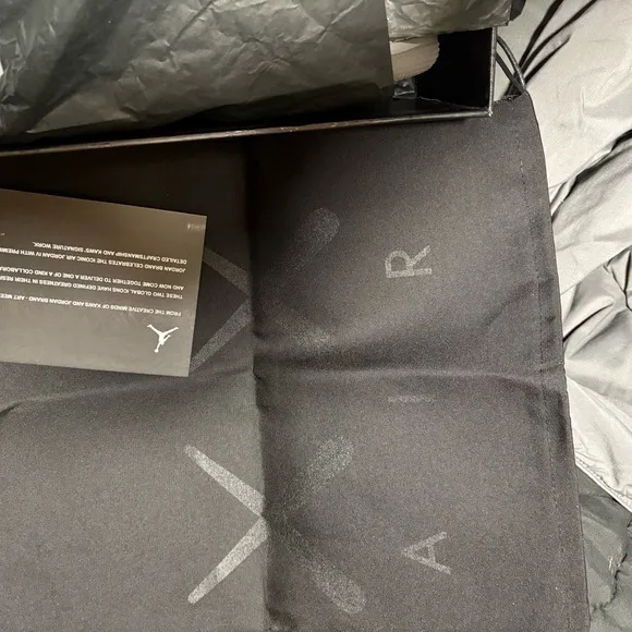 Gray Suede Sneakers Nike Jordan. Retro 4 kaws