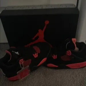 Jordan Black and Red Sneakers Classic Bred Design