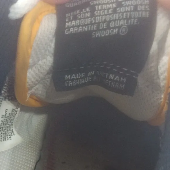Kids White and Gray Nike Shoes