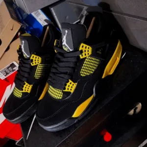 New Jordan 4 Thunder Men's Black and Yellow Sneakers