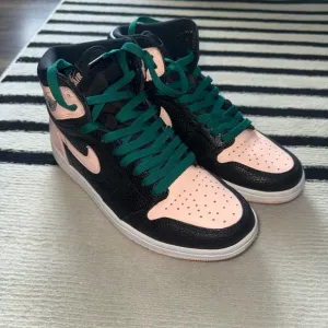 Nike Air Jordan 1 Sneakers in Crimson Tint Colorway