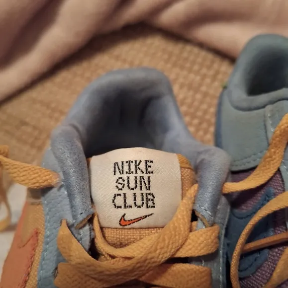 Nike Orange and Blue Sneakers with Low-Top Design
