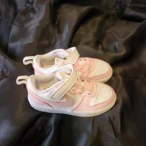 Nike Pink and White Sneakers for Everyday Style