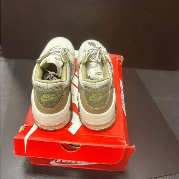Nike White and Tan Sneakers with Classic Silhouette