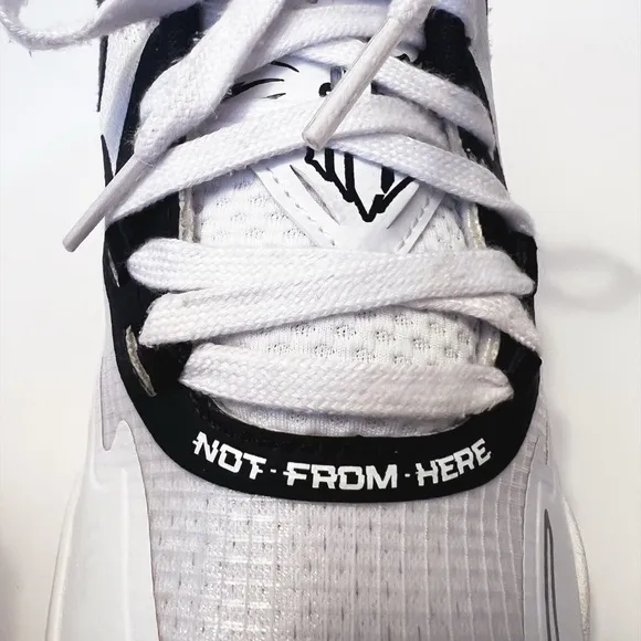 Puma Black and White Sneakers with Breathable Mesh Design