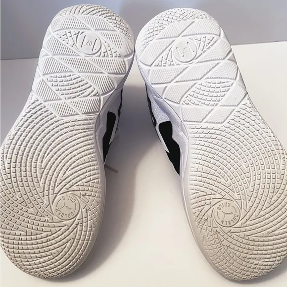 Puma Black and White Sneakers with Breathable Mesh Design
