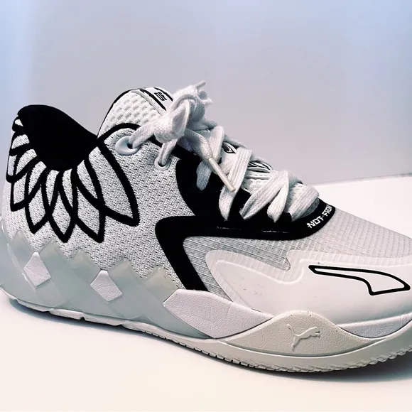 Puma Black and White Sneakers with Breathable Mesh Design