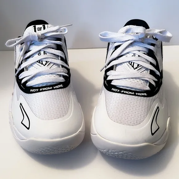 Puma Black and White Sneakers with Breathable Mesh Design