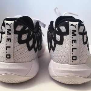 Puma Black and White Sneakers with Breathable Mesh Design