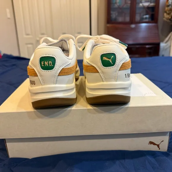 Puma White and Orange Sneakers