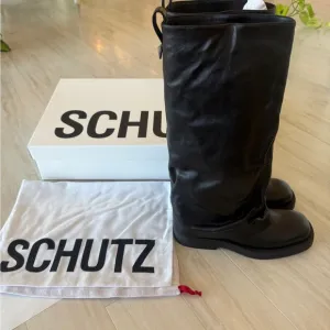Schutz Black Leather Boots ( brand new in the box never worn)
