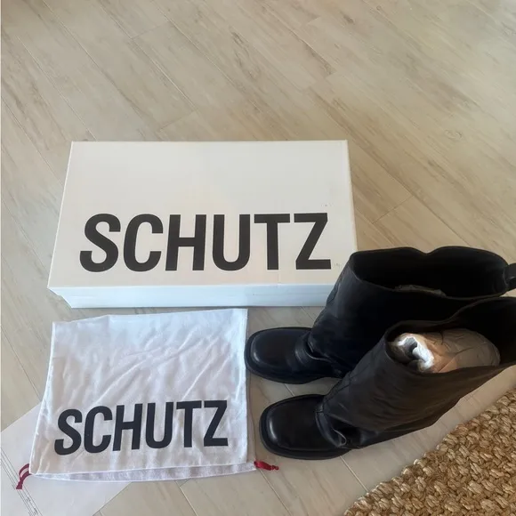 Schutz Black Leather Boots ( brand new in the box never worn)