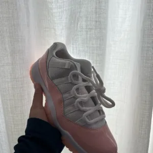 Women's Jordan 11 Lows Pink and White
